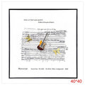 H-HGP51 - CUADRO DECORATIVO CON PARTITURA Y GUITARRA (20/1)